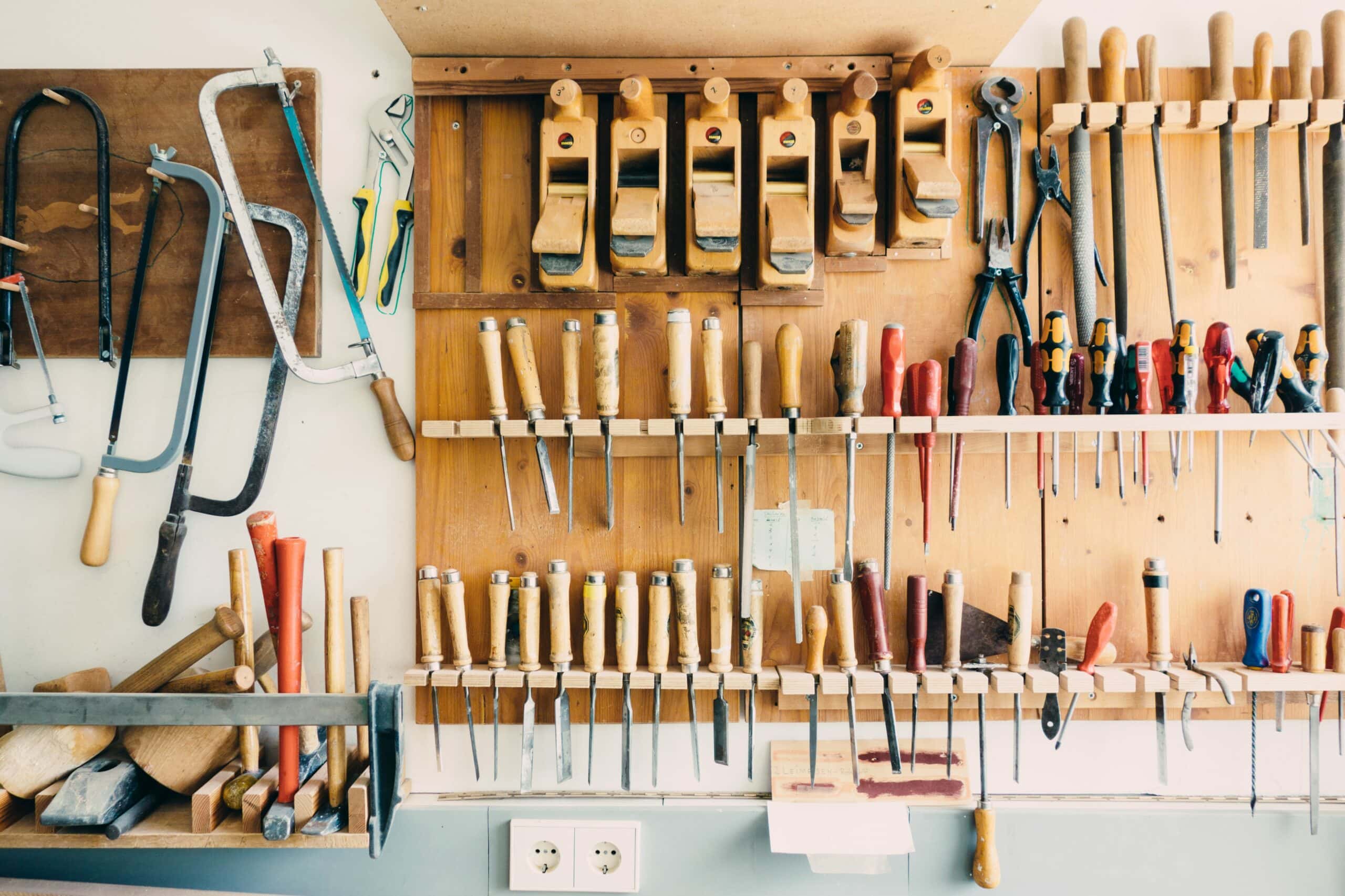 woodworking tools organized on the wall