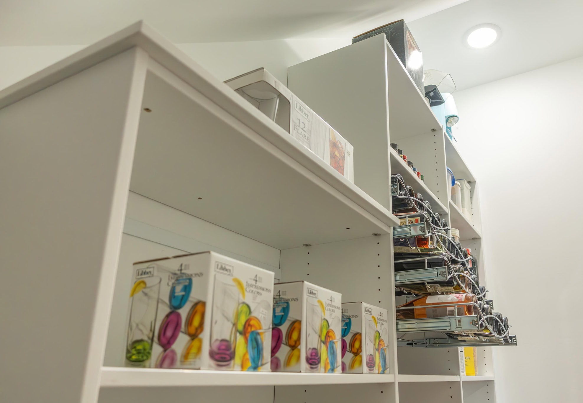 Close-up of shelves in a under-stair pantry