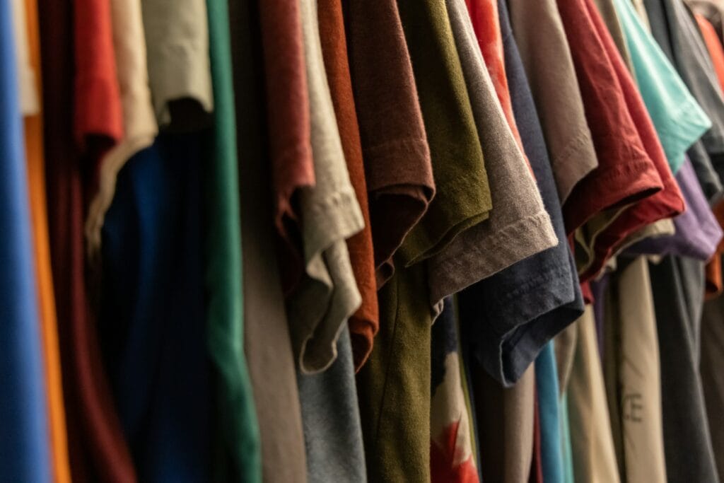 Disorganized T-shirts in a closet