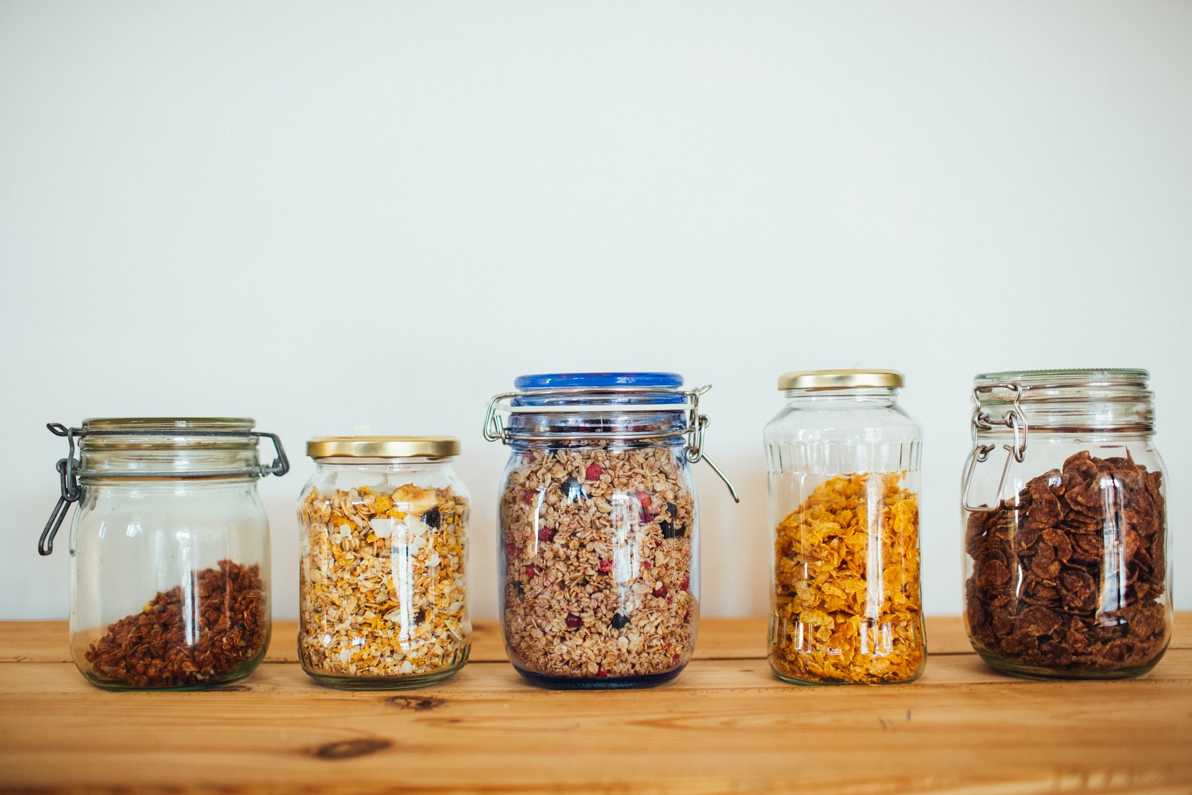 sealed jars on garage wall shelf